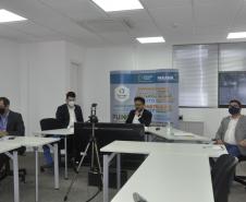 Videoconferência com agentes de crédito sobre campanha de renegociação.