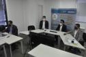 Videoconferência com agentes de crédito sobre campanha de renegociação.