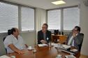 Reunião na Fomento Paraná com a participação do prefeito de Adrianópolis, João Manoel Pampanini, e do assessor jurídico do município, Clóvis Patriota; do diretor da Escola de Comunicação e Negócios da Universidade Positivo, Rogério Mainardes, e da professora Elisabete Tieme Arazaki, coordenadora do Núcleo de Estudo e Laboratório de Cidades da UP, com o presidente da Fomento Paraná, Juraci Barbosa, para debater a participação da instituição financeira estadual no Projeto Adrianópolis. 