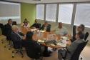 Reunião na Fomento Paraná com a participação do prefeito de Adrianópolis, João Manoel Pampanini, e do assessor jurídico do município, Clóvis Patriota; do diretor da Escola de Comunicação e Negócios da Universidade Positivo, Rogério Mainardes, e da professora Elisabete Tieme Arazaki, coordenadora do Núcleo de Estudo e Laboratório de Cidades da UP, com o presidente da Fomento Paraná, Juraci Barbosa, para debater a participação da instituição financeira estadual no Projeto Adrianópolis. 