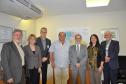 Reunião na Fomento Paraná com a participação do prefeito de Adrianópolis, João Manoel Pampanini, e do assessor jurídico do município, Clóvis Patriota; do diretor da Escola de Comunicação e Negócios da Universidade Positivo, Rogério Mainardes, e da professora Elisabete Tieme Arazaki, coordenadora do Núcleo de Estudo e Laboratório de Cidades da UP, com o presidente da Fomento Paraná, Juraci Barbosa, para debater a participação da instituição financeira estadual no Projeto Adrianópolis. 