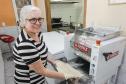 Ercilia Maria dos Santos, proprietária de pastelaria no Cajuru, ampliou o negócio através de financiamento pela Fomento Paraná.