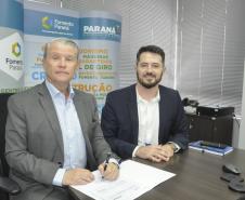 Jorge Callado, do Ipartes, e Vinícius Rocha, da Fomento Paraná, na apresentação do relatório de impactos socioeconômicos do crédito da Fomento no PIB estadual 