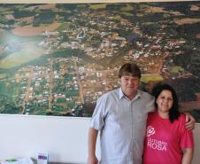 Prefeito de Sulina, Almir Maciel Costa, e a agente de crédito do município, Eliane Ritter.