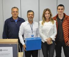 Membros da comissão eleitoral da Fomento Paraná para eleição de representante no Conselho de Administração com os candidatos.