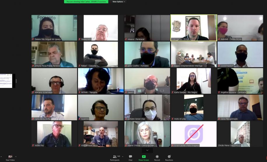 Videoconferência com agentes de crédito sobre campanha de renegociação.